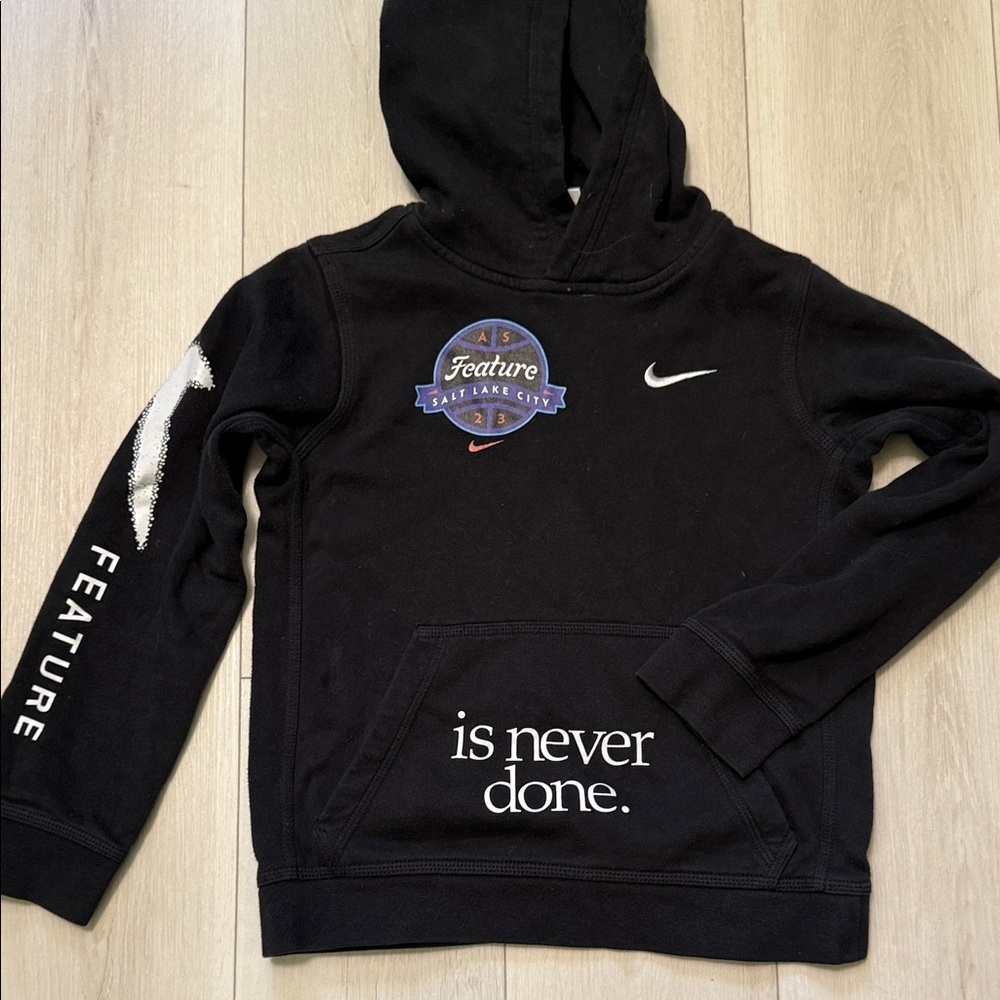 Nike Kids Black Hoodie with Graphic Accents Feature Salt Lake City Basketball